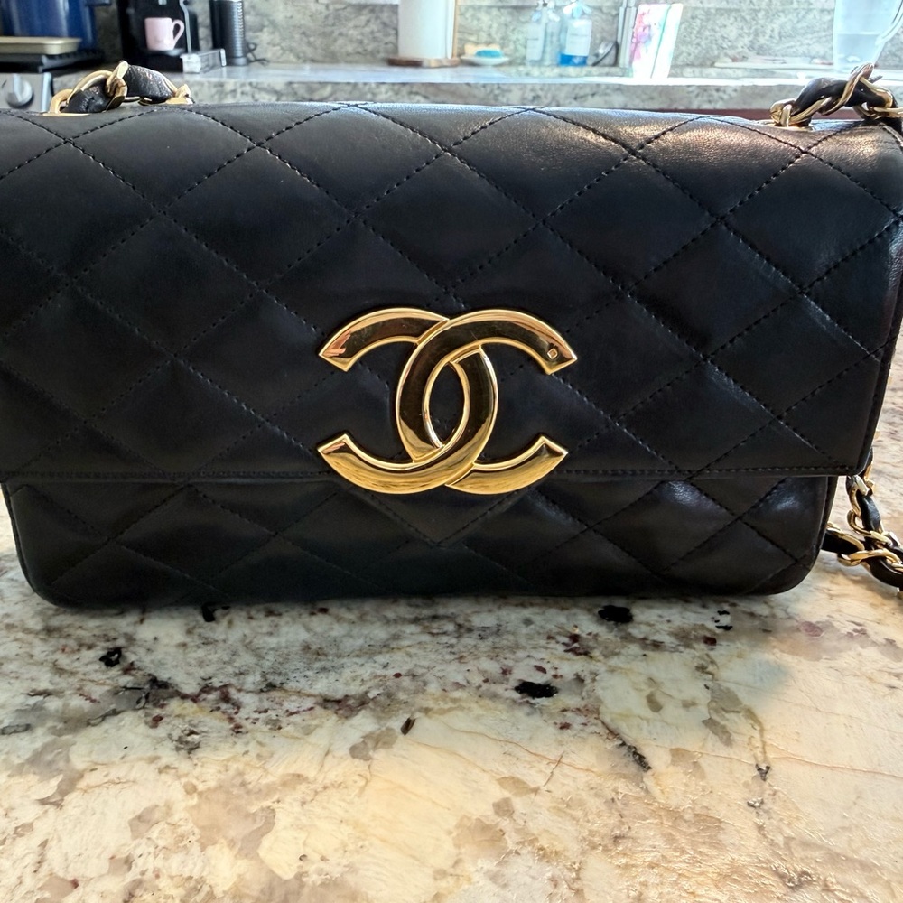 CHANEL Black Quilted Crossbody Bag with Gold Accents - Picture 2 of 8
